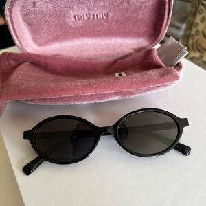 Miu Miu 01XV Black Sunglasses – Oval Frame, Bold & Sculptural, Authentic